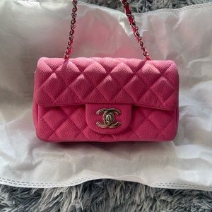 CHANEL
Classic Extra Mini Flap Bag